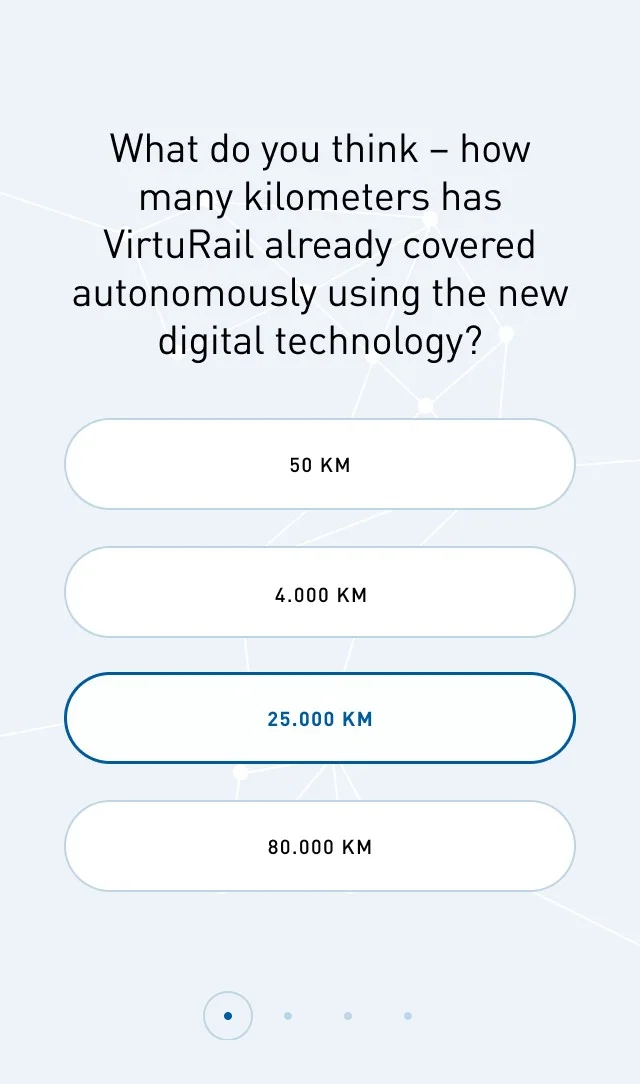 The question on a phone — how many kilometres VirtuRail has covered autonomously — with four distances to choose from and one of them selected.